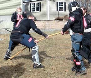 attempt to lift a man at the end of a spear